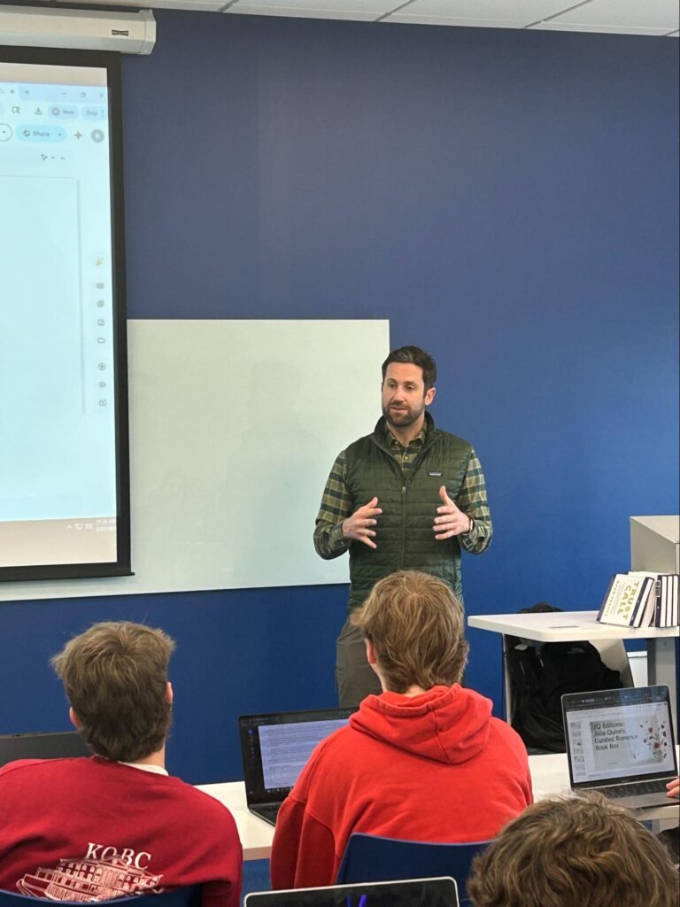 Man presenting in classroom setting